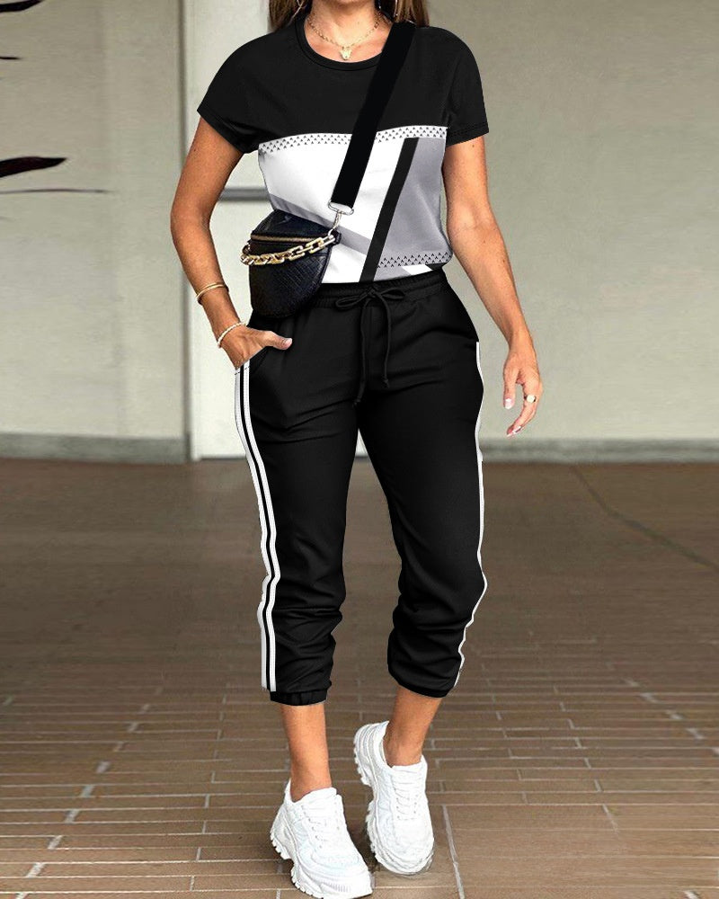 solid color round neck top multi-pocket pants suit, Autumn / Winter Collection