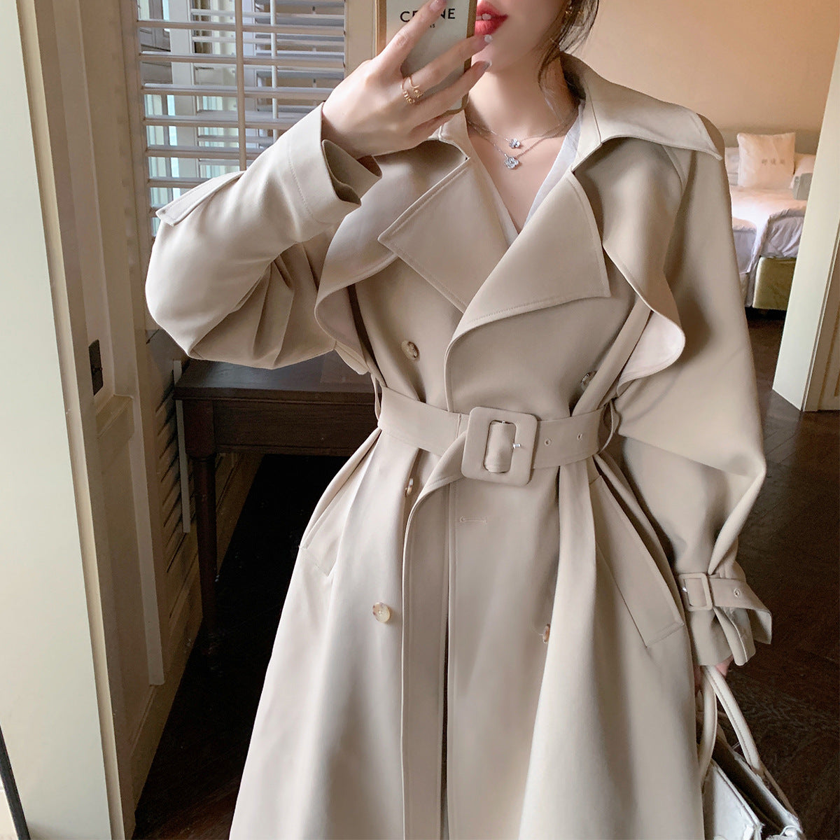 The British overcame the khaki trench coat girl