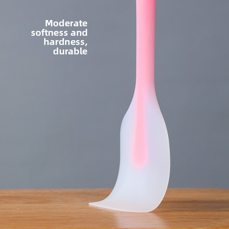 One-piece cream silicone scraper