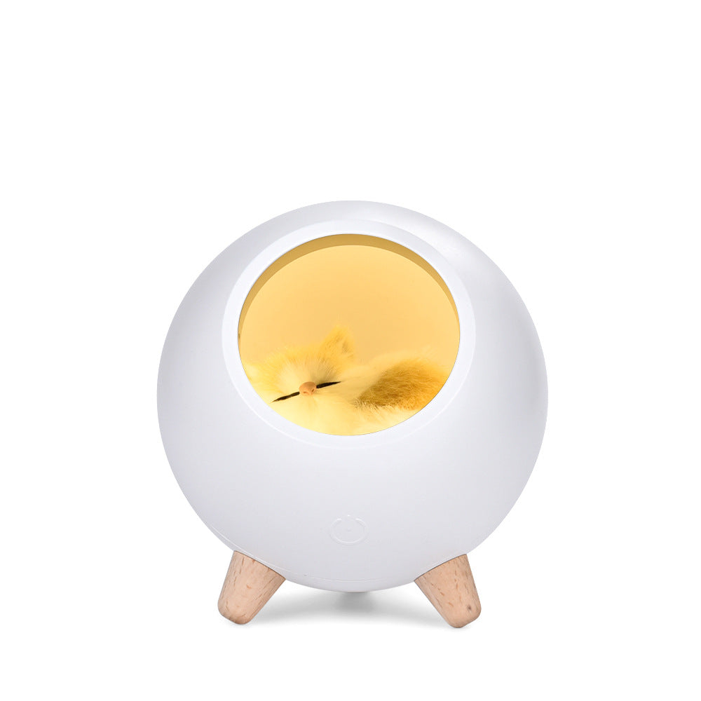 A cartoon cat bed atmosphere night light for girls
