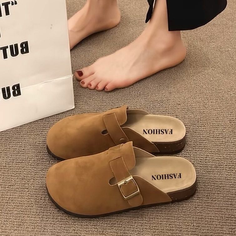 Half a slipper and one foot on lazy trendy shoes