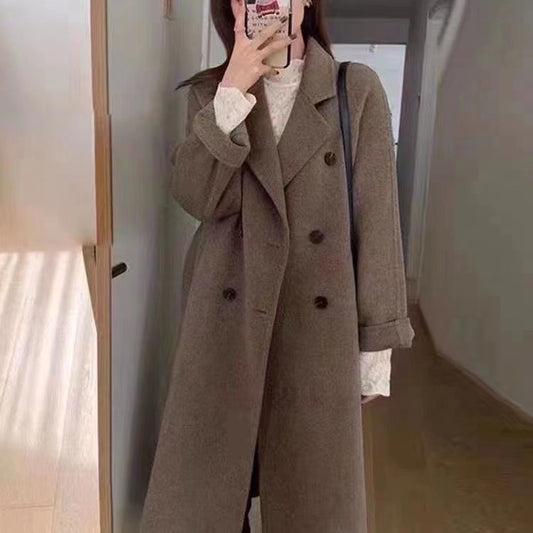 A loose and thick woolen coat for a short person