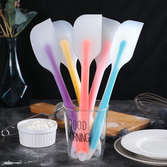 One-piece cream silicone scraper