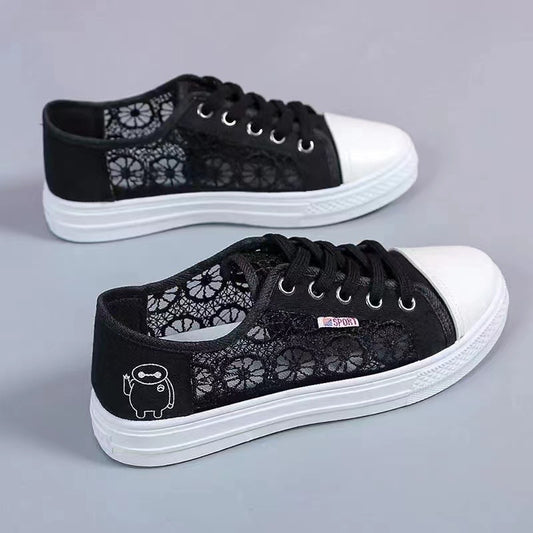 Women in flat lace canvas shoes