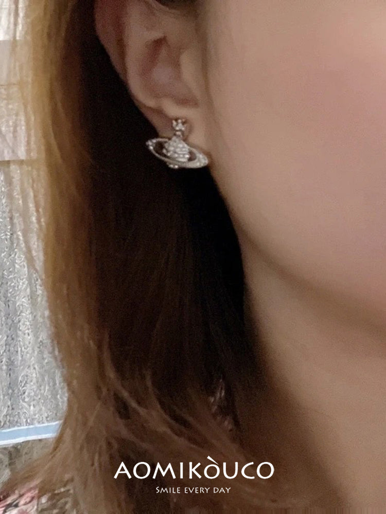 Luxusní a elegantní náušnice s diamanty 