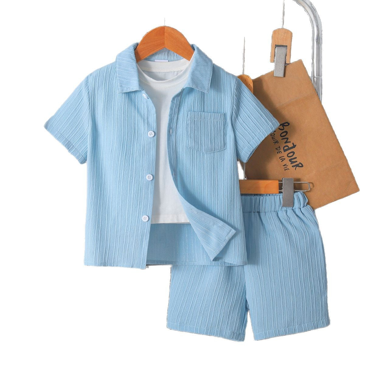 Boy's stylish gentleman's summer outfit in college style